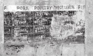 Sidney Harden's advertisement on the outside of the grocery store's wall. Published in St. Petersburg Historic 22nd Street South by Peck and Wilson, 2006, 68.